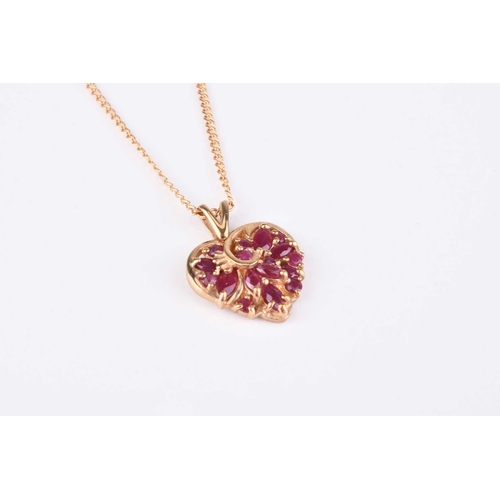 136 - A 9ct gold heart shaped ruby set pendant on chain, together with a ruby and diamond ring, stamped '9... 