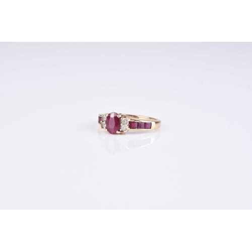 136 - A 9ct gold heart shaped ruby set pendant on chain, together with a ruby and diamond ring, stamped '9... 