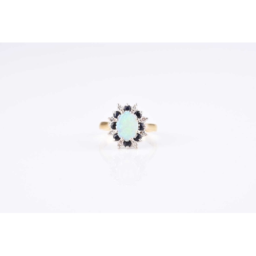 147 - An 18ct gold opal, sapphire and diamond ring, designed as a central oval cabochon opal claw set with... 