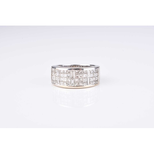 150 - A Princess and baguette cut diamond set band, designed as a panel of Princess and baguette cut diamo... 