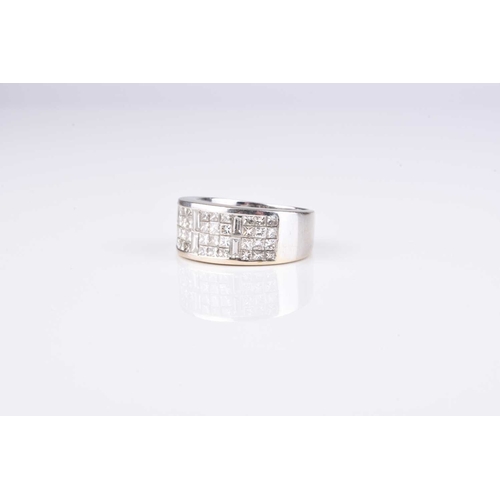 150 - A Princess and baguette cut diamond set band, designed as a panel of Princess and baguette cut diamo... 