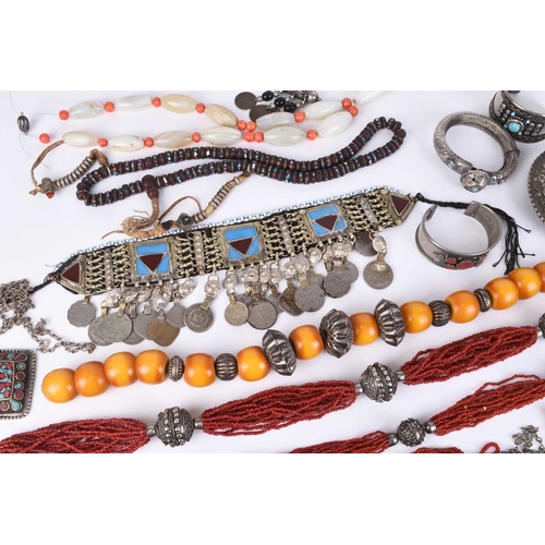 151 - A collection of South American jewellery and costume jewellery, to include; bangles, multi-strand be... 