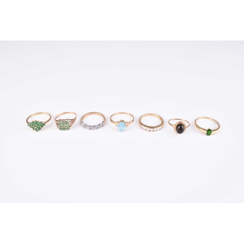 177 - A collection of 9ct gold stone set rings, comprising; an opal example, size T, two green stone set e... 