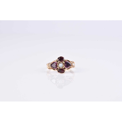 180 - A Victorian 12ct gold garnet and split pearl ring, hallmarked Birmingham, weight approx 1.9g