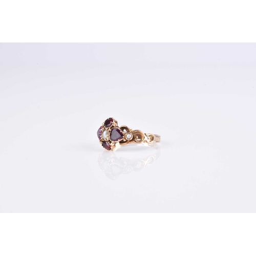 180 - A Victorian 12ct gold garnet and split pearl ring, hallmarked Birmingham, weight approx 1.9g