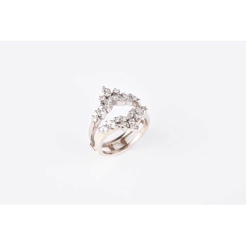 187 - A diamond set double herringbone ring, the round faceted diamond claw set in white metal to white me... 