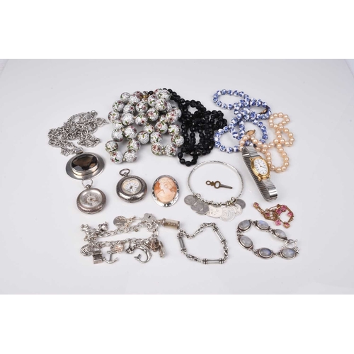 193 - A small collection of jewellery and costume jewellery, to include; a silver charm bracelet, a white ... 