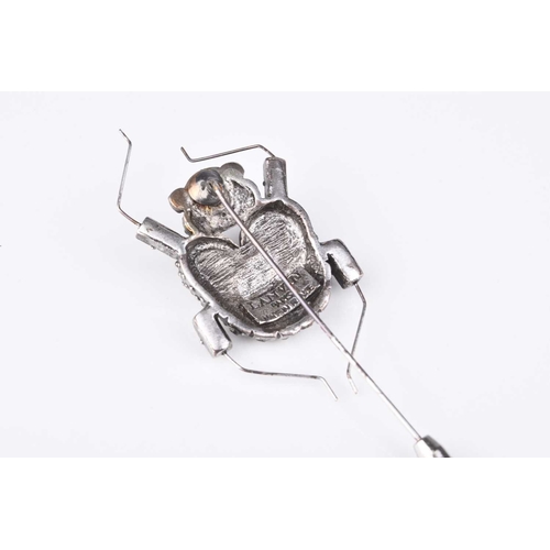 195 - A Lanvin brooch pin in the form of an insect, 7.5cm long (including pin), with accompanying Lanvin p... 