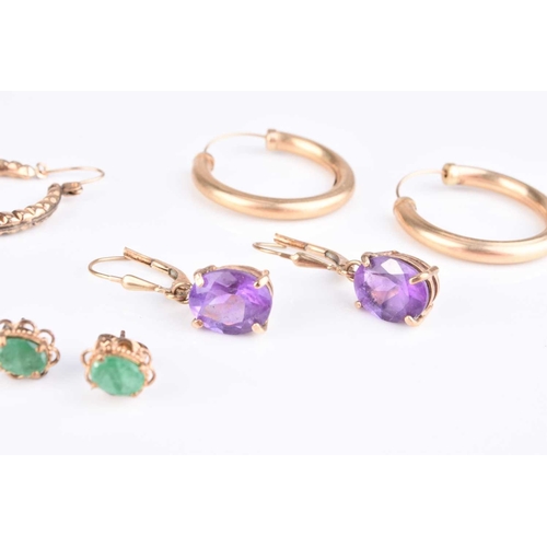 214 - A collection of earrings, to include; a pair of 9ct gold amethyst examples, a pair of 9ct gold polis... 