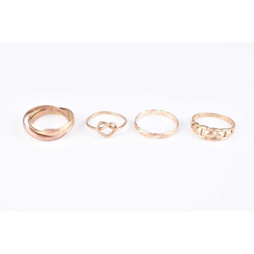 230 - Four 9ct gold rings, comprising; two tri-coloured band, sizes V and T, a stylised heart band, size P... 