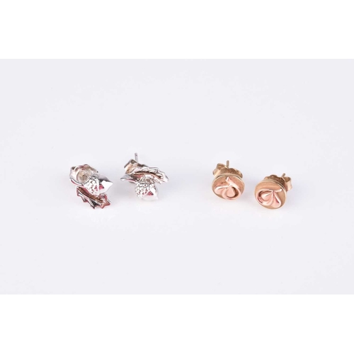 234 - A pair of 9ct rose gold Clogau stud earrings, each with stylised heart design, weight approx 2.4g, t... 