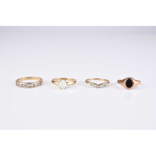 238 - A collection of four 9ct gold stone set rings, comprising; two opal rings, sizes S and T, a diamond ... 