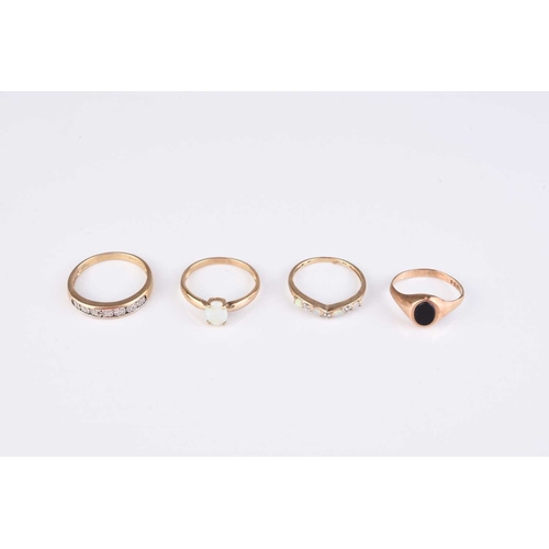 238 - A collection of four 9ct gold stone set rings, comprising; two opal rings, sizes S and T, a diamond ... 