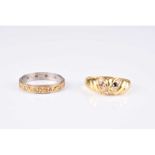 239 - An 18ct yellow and white gold stone band, size Q ½, weight approx. 2.8g, together with a yellow meta... 