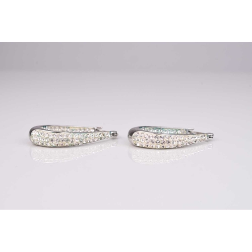 252 - A pair of yellow metal diamond set hoop earrings, stamped '14k', together with a pair of white metal... 