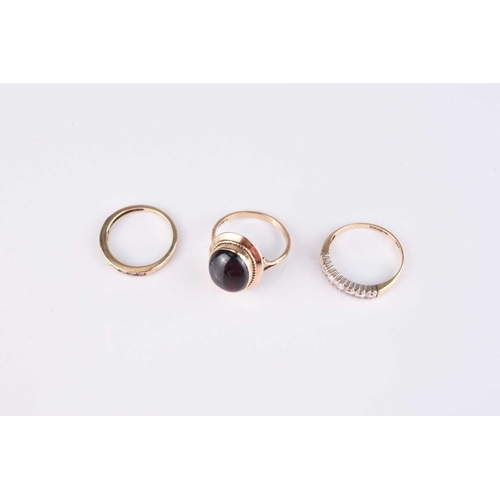 254 - Three 9ct gold stone set rings, comprising; a cabochon garnet example, size L, a diamond set example... 