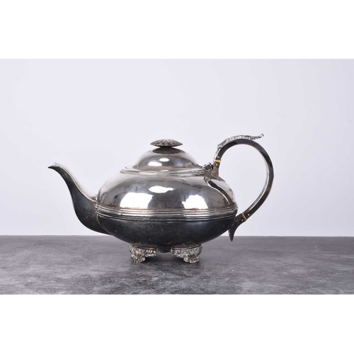 26 - A George IV silver teapot, T D, London 1826, of circular form with reeded band to waist, the acanthu... 