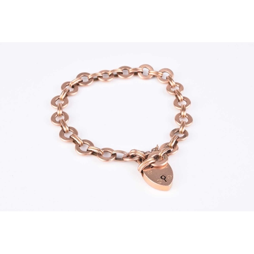 262 - A 9ct rose gold circular link bracelet, with heart shaped padlock clasp, weight approx 10.8g