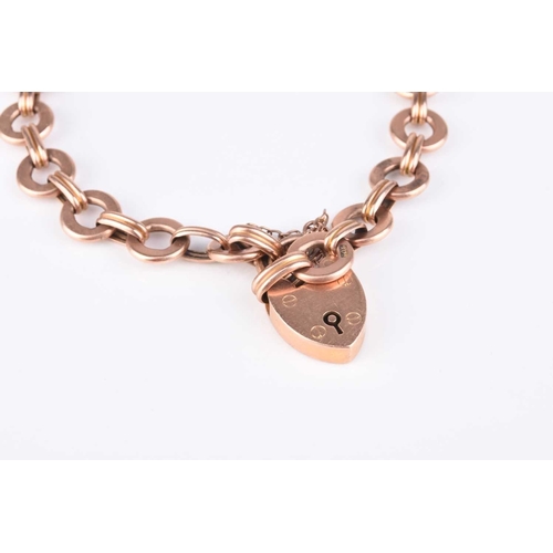 262 - A 9ct rose gold circular link bracelet, with heart shaped padlock clasp, weight approx 10.8g