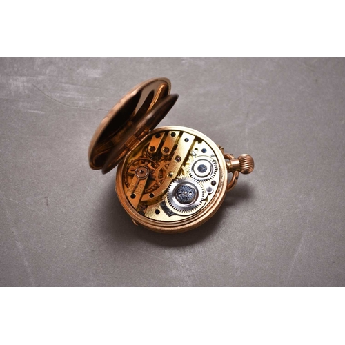 267 - A lady's 14ct gold open face fob watch Date: Circa 1910 Movement: Jewelled bridge plate, stem wind a... 