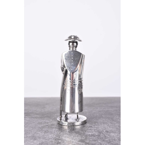 27 - An Edwardian novelty figural silver pepper pot, Cornelius Desormeaux Saunders & James Francis Hollin... 