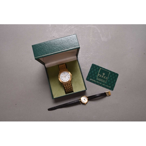 277 - Gucci: A gentleman's gold plated bracelet watch Ref. 7300, 1996, quartz movement, white dial with Ro... 