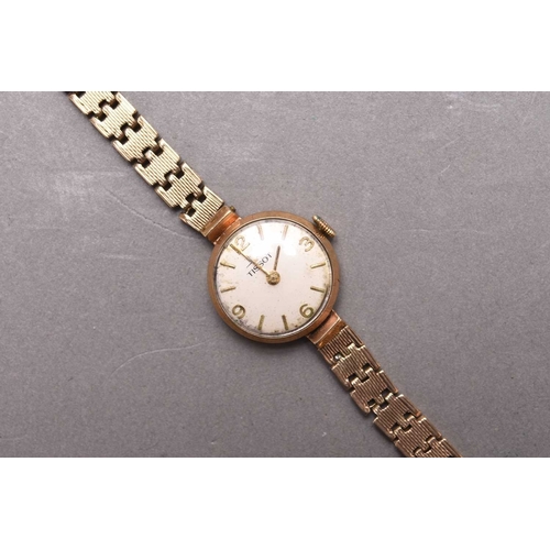 290 - Tissot: A lady's 9ct gold bracelet watch Date: Circa 1961 Movement: 17 jewel manual wind Dial: Silve... 