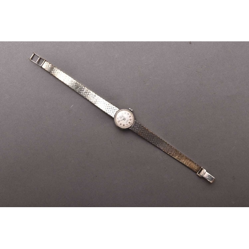 293 - Verity: A lady's 9ct white gold bracelet watch Date: Circa 1965 Movement: 17 jewel manual wind Dial:... 