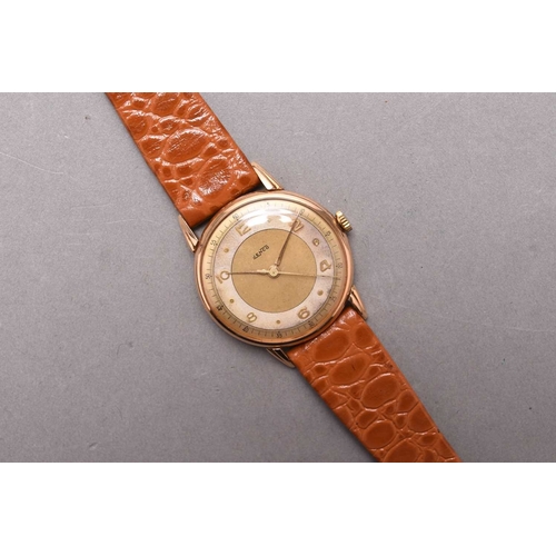 296 - JenCo: A gentleman's 18ct gold wristwatch Date: Circa 1940 Movement: 17 jewel manual wind Dial: Gold... 