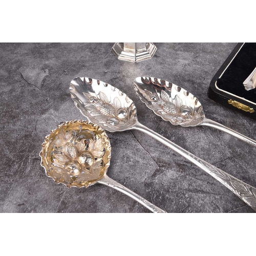 30 - A small collection of silver, comprising; a cased set of fruit spoons, Birmingham 1935, together wit... 