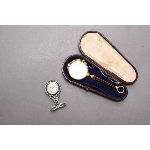 305 - A lady's paste set fob watch The open face chromium-plated watch within a paste-set bezel with bow b... 