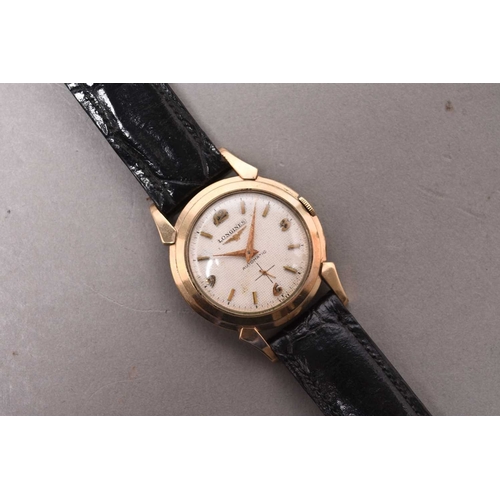 316 - Longines: A gold filled wristwatch Date: 1952 Movement: 17 jewel Cal.19A automatic Dial: Textured si... 