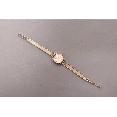 322 - Omega: A lady's wristwatch with 9ct gold bracelet Date: Circa 1965 Movement: Jewelled manual wind Di... 