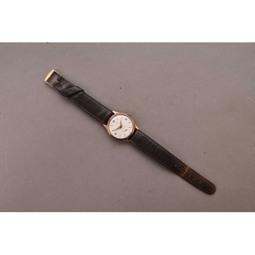 328 - Garrard: A gentleman's 9ct gold wristwatch Date: 1961 Movement: 17 jewel manual wind Dial: Silver, a... 