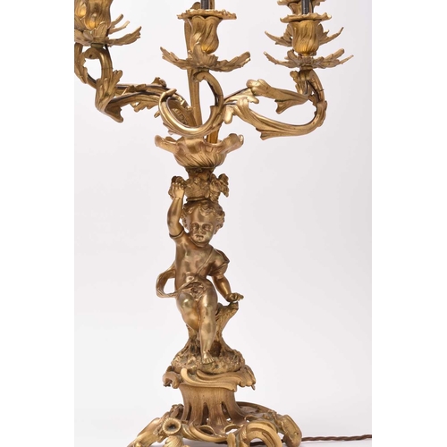 385 - A pair of ormolu rococo revival figural candelabra table lights 19th/20th century, the six branches ... 