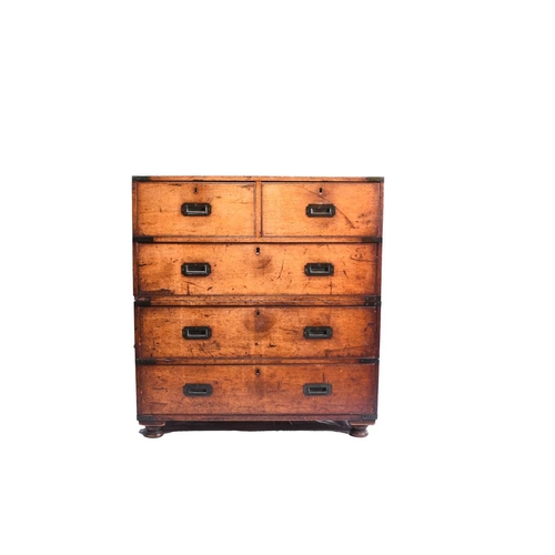 399 - A 19th century mahogany campaign chest In two sections with iron carrying handles, the upper with tw... 