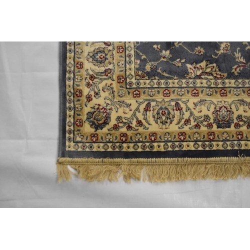 411 - A Ziegler design rug, Kashmir With flowers and trailing foliage on a duck egg blue ground. 170cm x 1... 