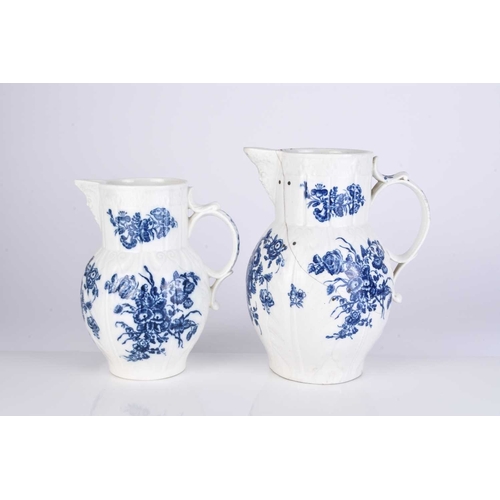 434 - Two Caughley porcelain 'Bouquets' cabbage leaf maskhead jugs, circa 1785, transfer-printed in underg... 