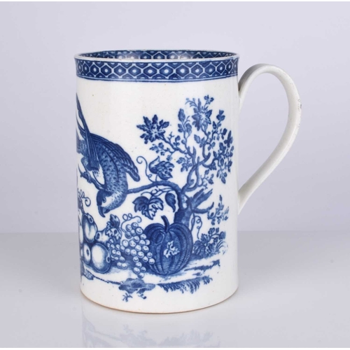 437 - A large Caughley 'Parrot Pecking Fruit' porcelain mug, circa 1780-85, transfer-printed in underglaze... 