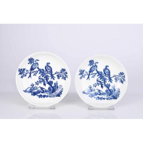 438 - Two Caughley porcelain 'Birds in Branches' tea bowls and saucers, one circa 1778-80, the other 1785-... 