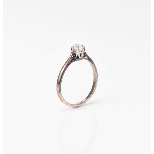 44 - A single stone diamond ring, the old cut diamond claw set in white metal, stamped '18ct', ring size ... 