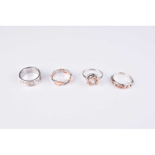 47 - Four silver Clogau rings, comprising; a silver and gilt entwined oak leaf band, a silver and gilt ba... 