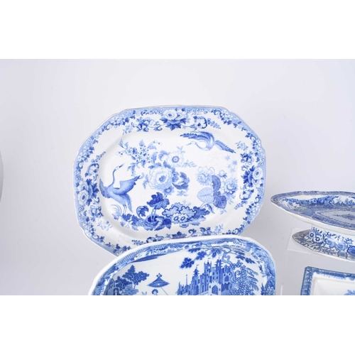 478 - A collection of English blue and white earthenware, early 19th century, comprising a compartmentaliz... 