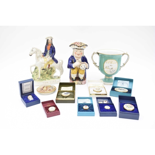 491 - A collection of pottery comprising a Staffordshire figure of 'Tom King', mid-19th century, a toby ju... 