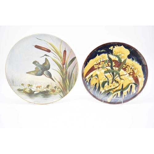 498 - A group of art pottery chargers and plates, early 20th century, comprising an Old Moravian (Austria)... 