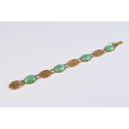 50 - A Chinese yellow metal and jadeite panel bracelet, with integral push clasp, stamped '18k', 18.5cm l... 