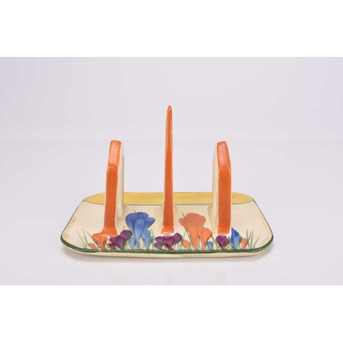 507 - A Clarice Cliff for Newport Pottery Bizarre toast rack in the Crocus pattern, circa 1928-30s of rect... 