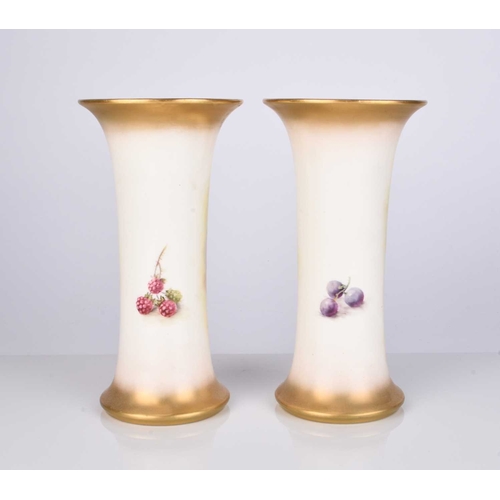 508 - A pair of Royal Worcester vases painted with fruit by Thomas Lockyer, circa 1929, painted to one sid... 