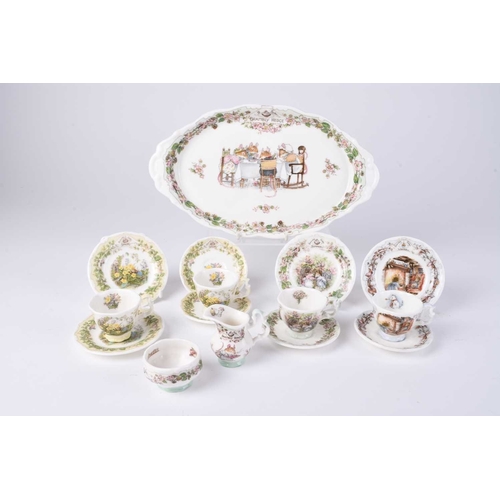 530 - A Royal Doulton Brambly Hedge miniature seasons tea service, comprising a tray, four teacups, four s... 