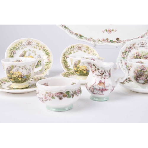 530 - A Royal Doulton Brambly Hedge miniature seasons tea service, comprising a tray, four teacups, four s... 